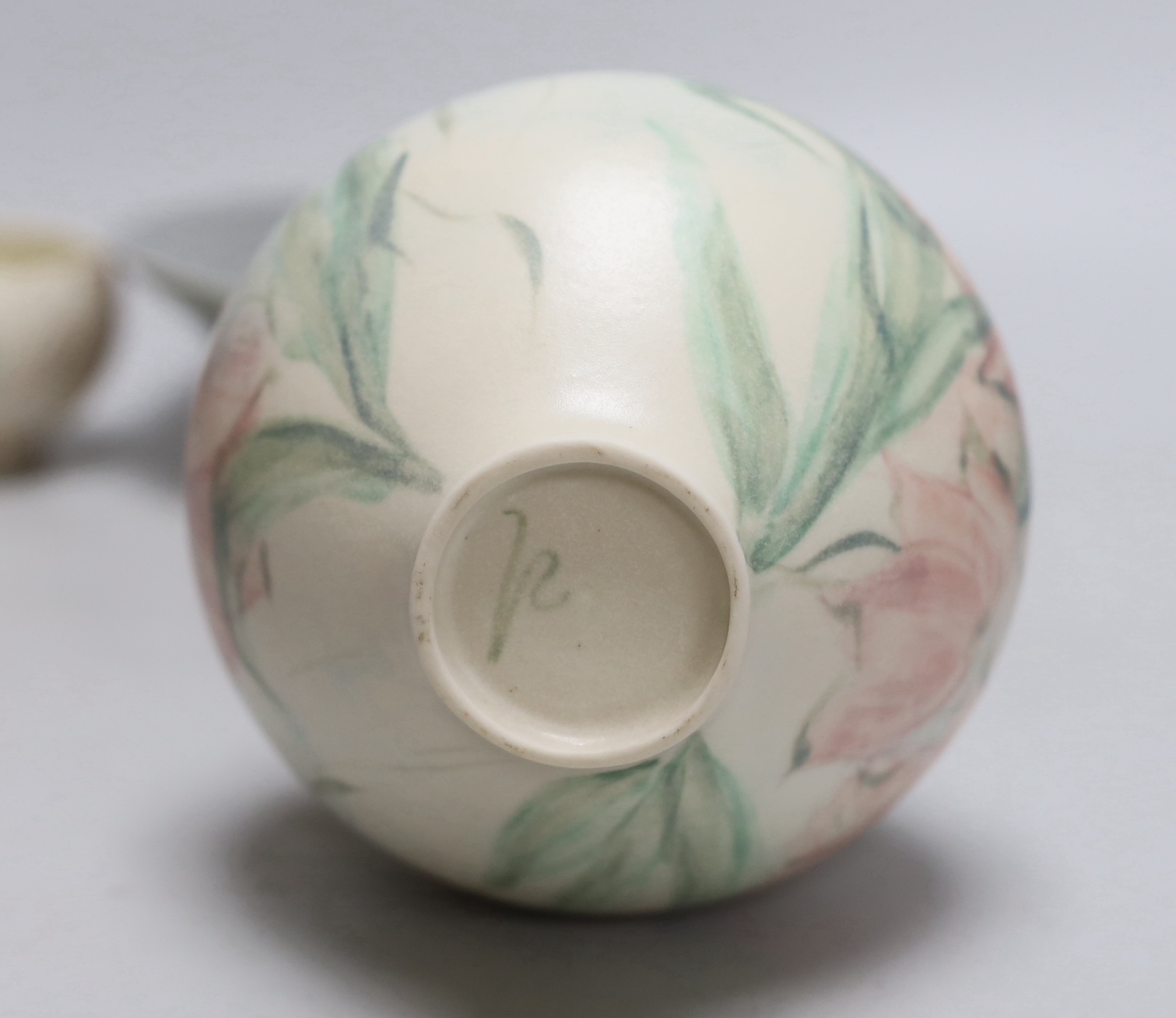 Three hand thrown and carved stoneware pieces by one maker purchased at Water Perry, Oxford, each signed to the base, the largest 23cm in diameter